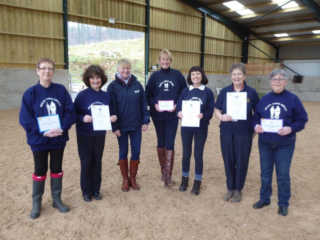 group of people showing their long service awards